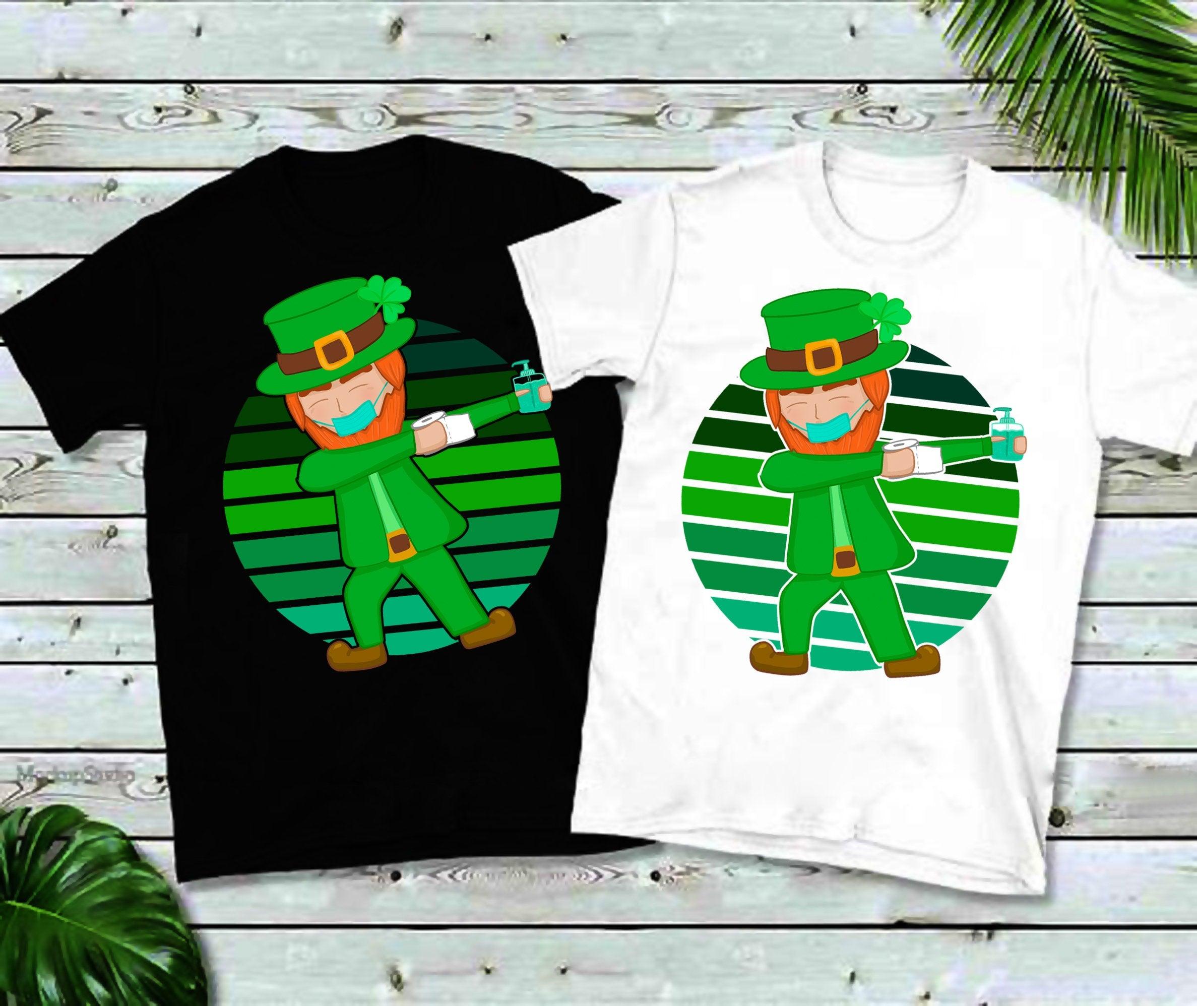 Masked Dabbing Leprechaun St. Patrick&#39;s Day Green Retro Sunset T-Shirts four leaf clover, irish, irish gift, luck of the irish, lucky clover, saint patricks day, shamrock, shamrock shirt, st patricks day, st patricks day tee, st patricks shirt, st pattys day, three leaf clover - plusminusco.com